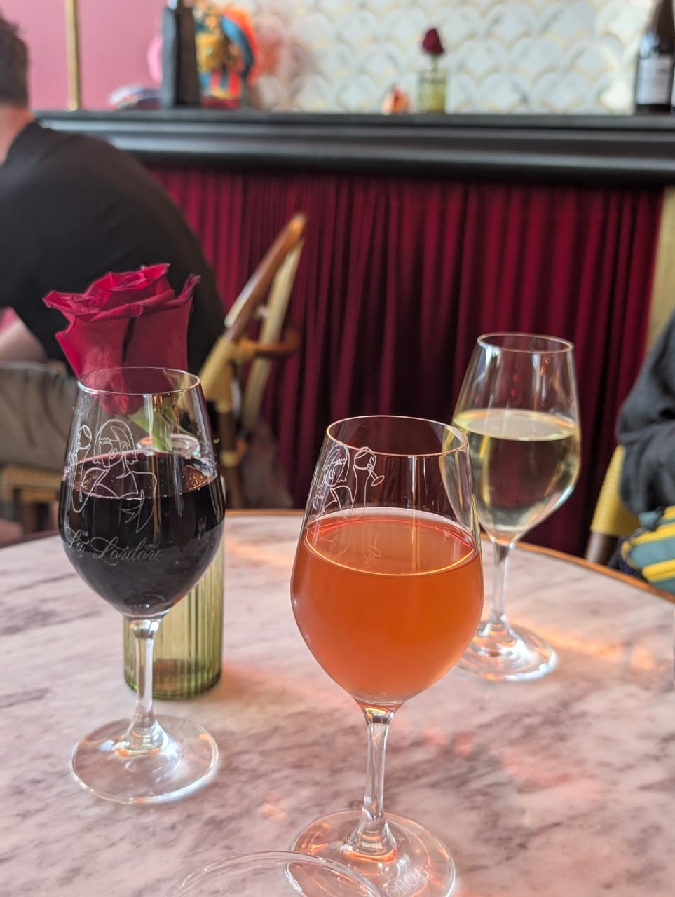 Wine and cocktail on a table